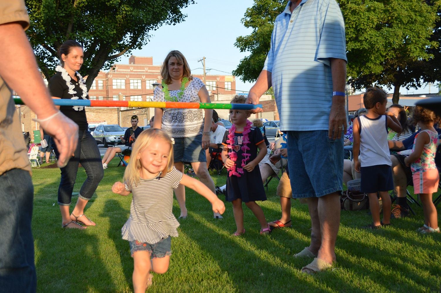 Kids limbo during the Mr. Meyers concert at Cortesi Veterans Memorial Park on Aug. 4, 2016.
